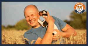Dog Licking Owner's Ears in a Field.